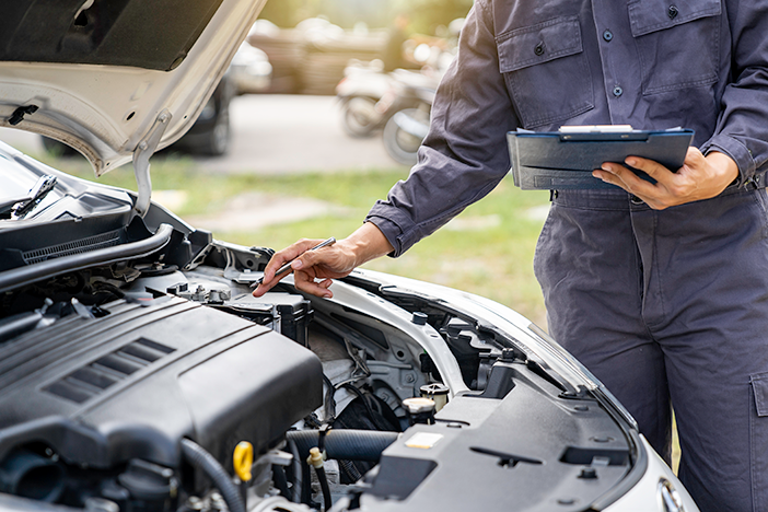 certified box truck ASE mechanic inspecting for presale or post sale of a vehicle car truck